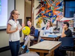 photo of a student giving a presentation